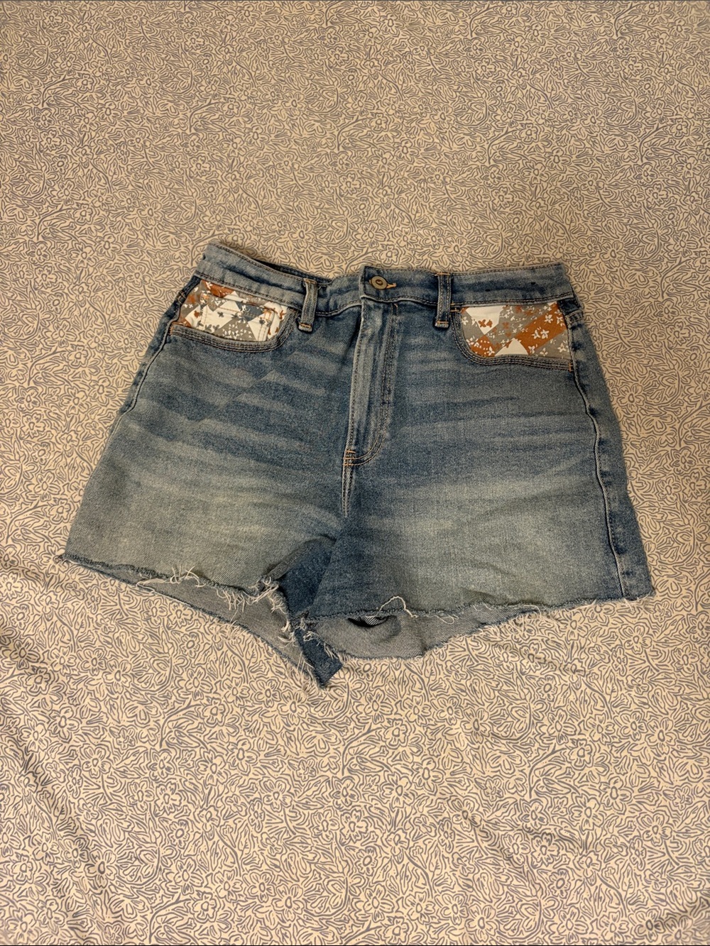 Hollister Light Blue Denim Shorts with Patterned Pocket Accents